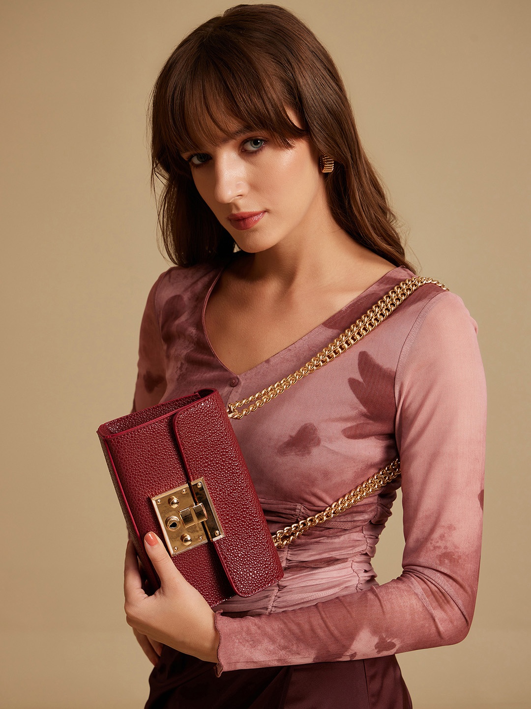 

Kazo Mesmerize Leather Gold Lock Sling Bag, Maroon