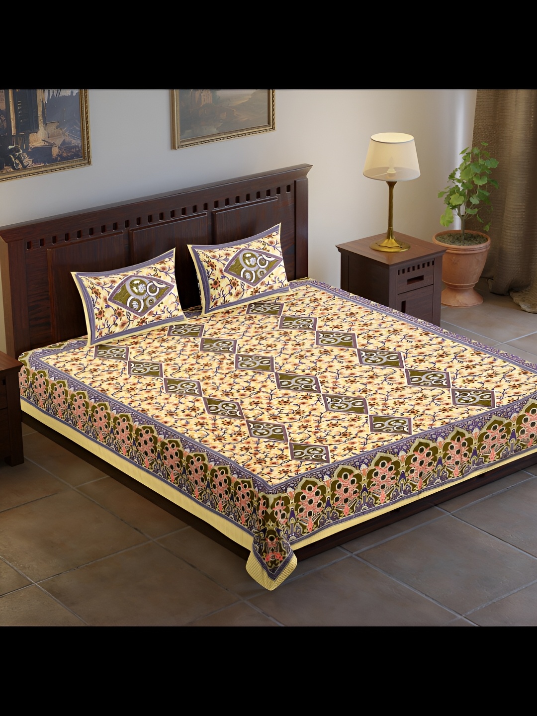 

UBANIA COLLECTION Yellow & Peach Printed Cotton 120 TC King Bedsheet With 2 Pillow Covers