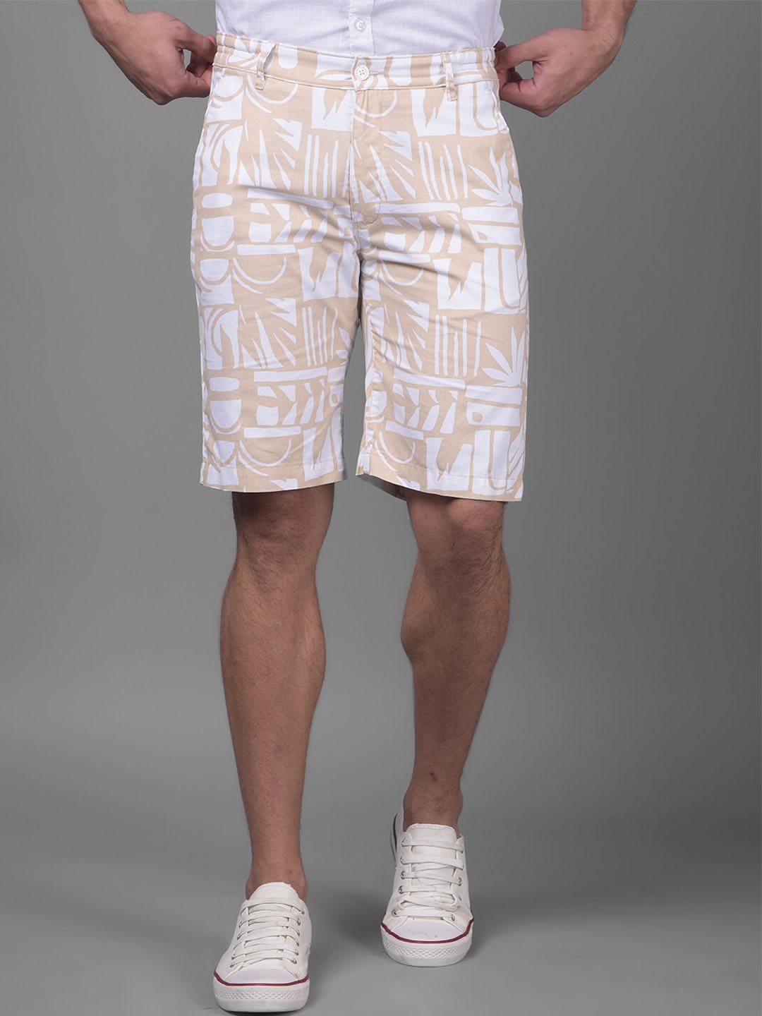 

Crimsoune Club Men Geometric Printed Mid-Rise Pure Cotton Regular Shorts, Beige