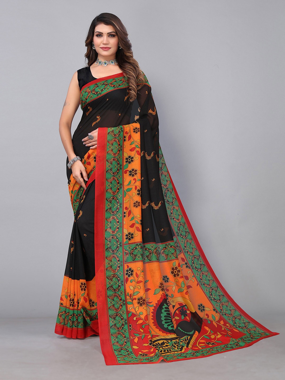 

HRITIKA Black and Orange Ethnic Motifs Brasso Saree