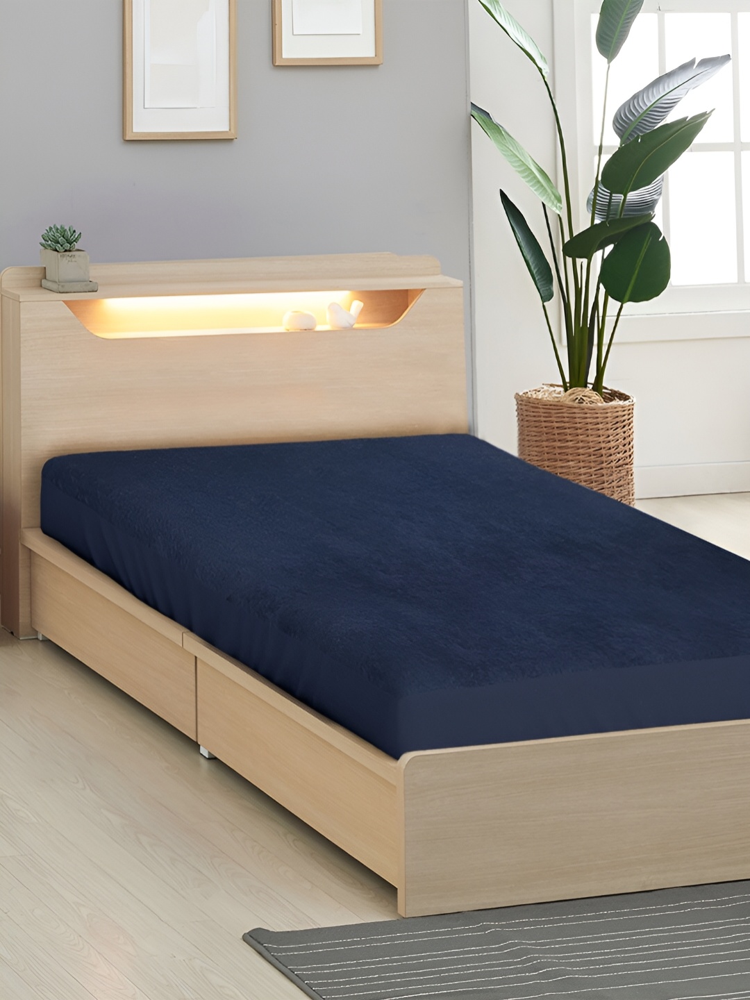 

Aura Navy Blue Terry Cotton Single Bed Water Resistant Mattress Protector