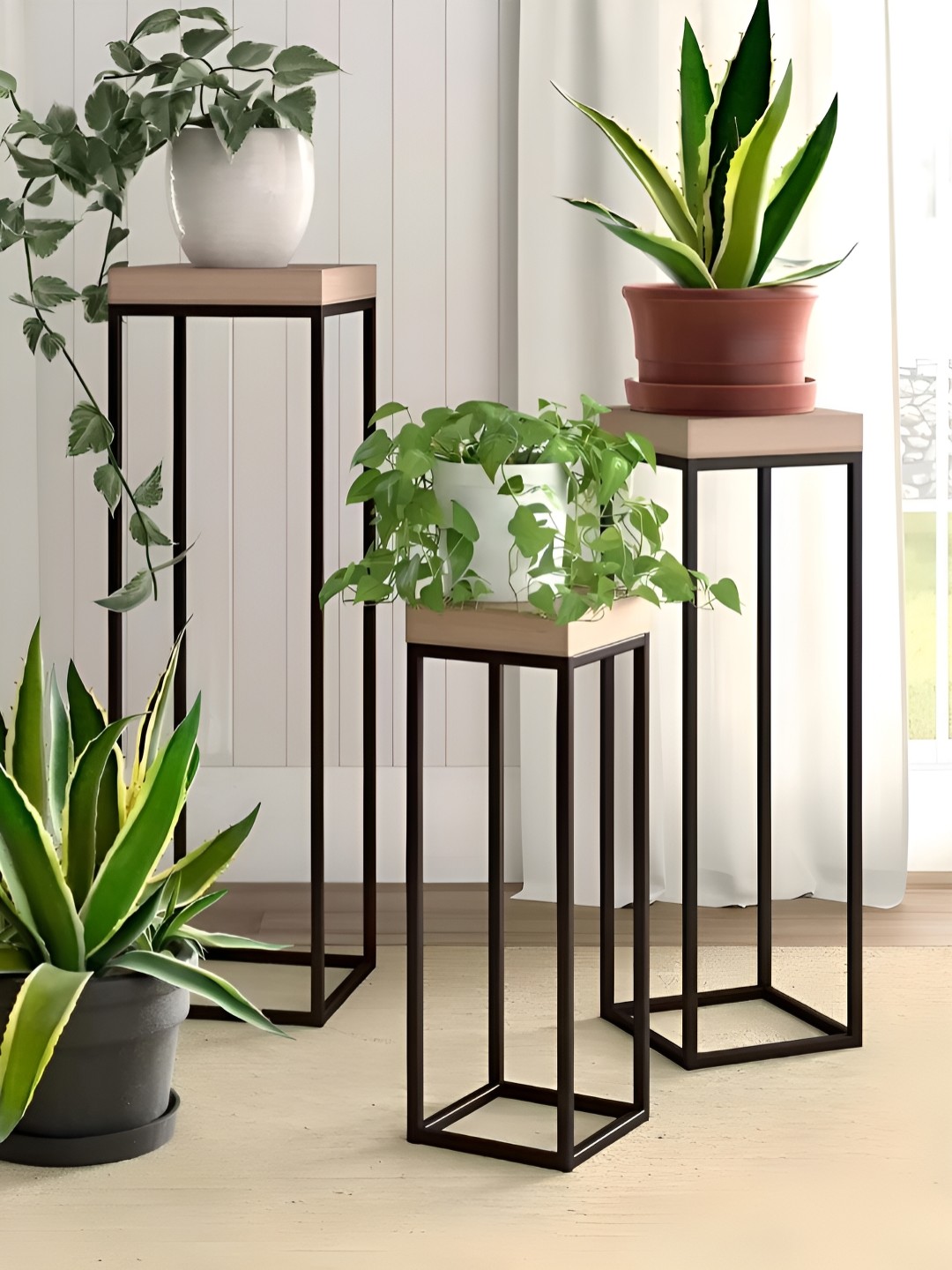 

The Art House Black Textured Ceramic Planter With Holder