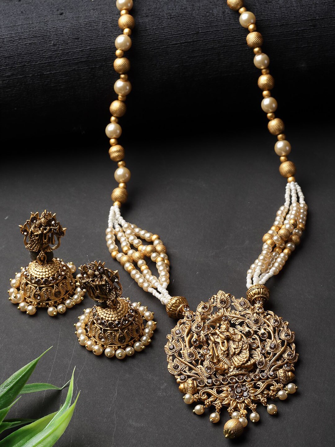 

ADIVA Gold Plated Stones Studded & Beaded Jewellery Set