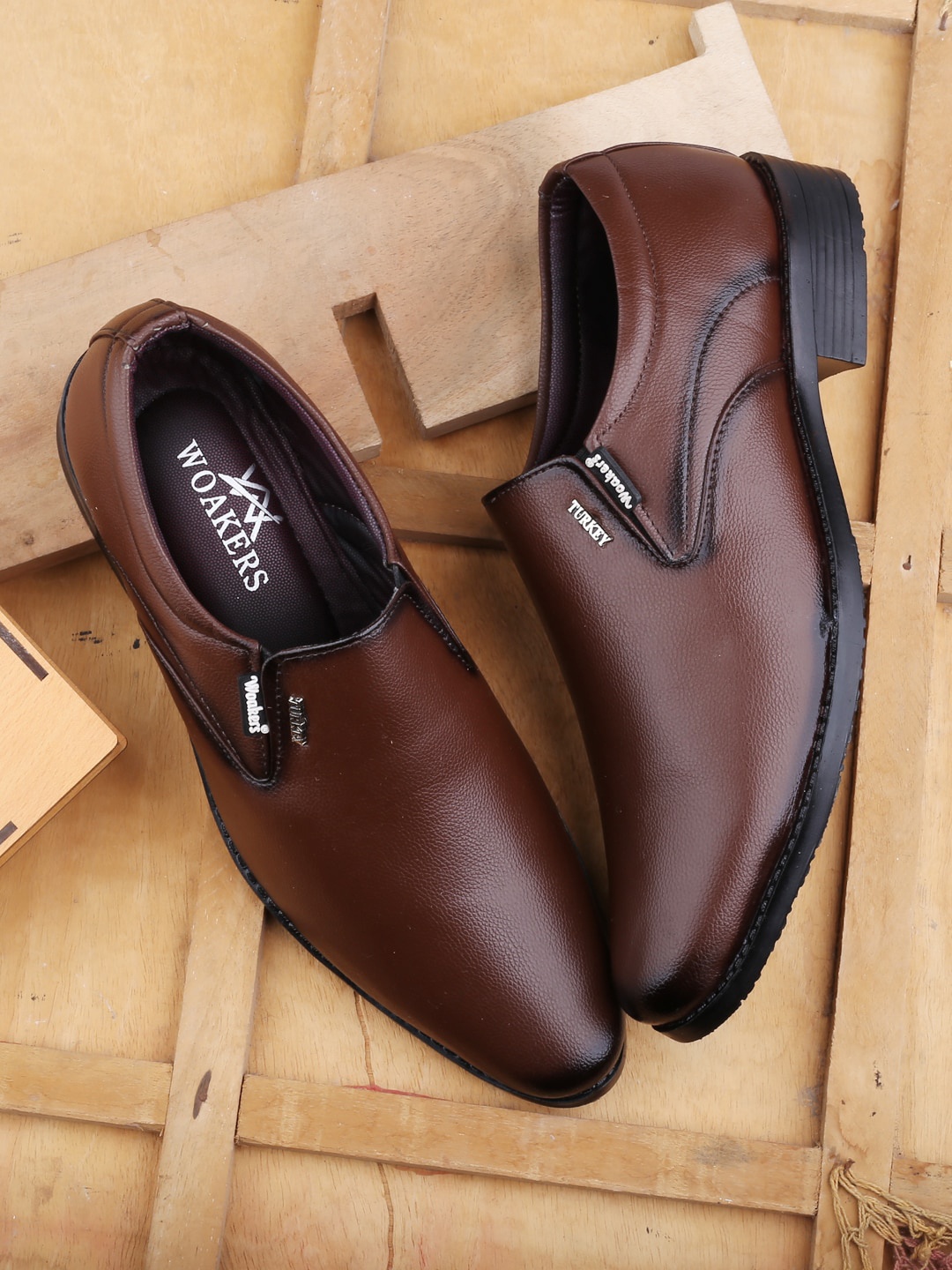 

Woakers Men Textured Formal Slip-On Shoes, Brown