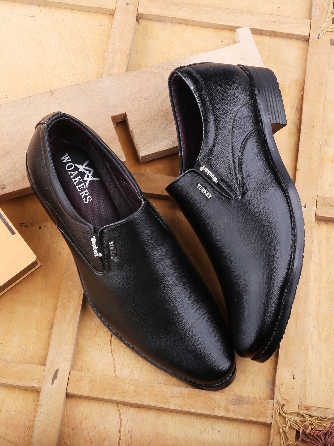 

Woakers Men Textured Formal Slip-On Shoes, Black