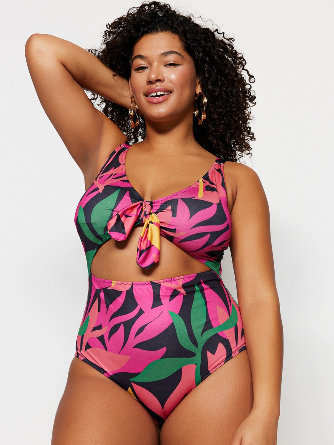 

Trendyol Plus Size Floral Printed Shoulder Straps Cut Outs Swim Bodysuit, Purple