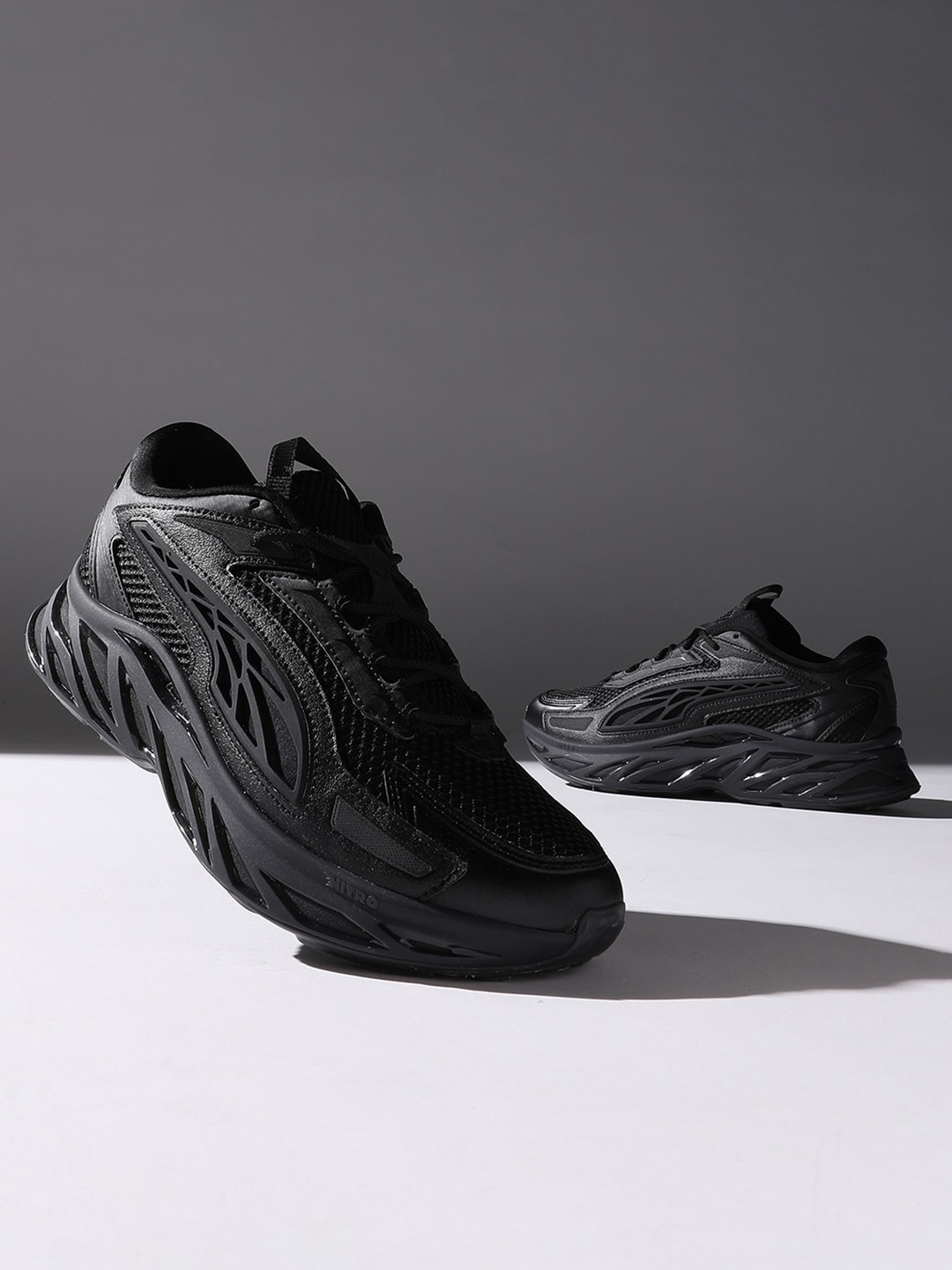 

Puma Unisex Exotek NITRO Base Sneakers, Black