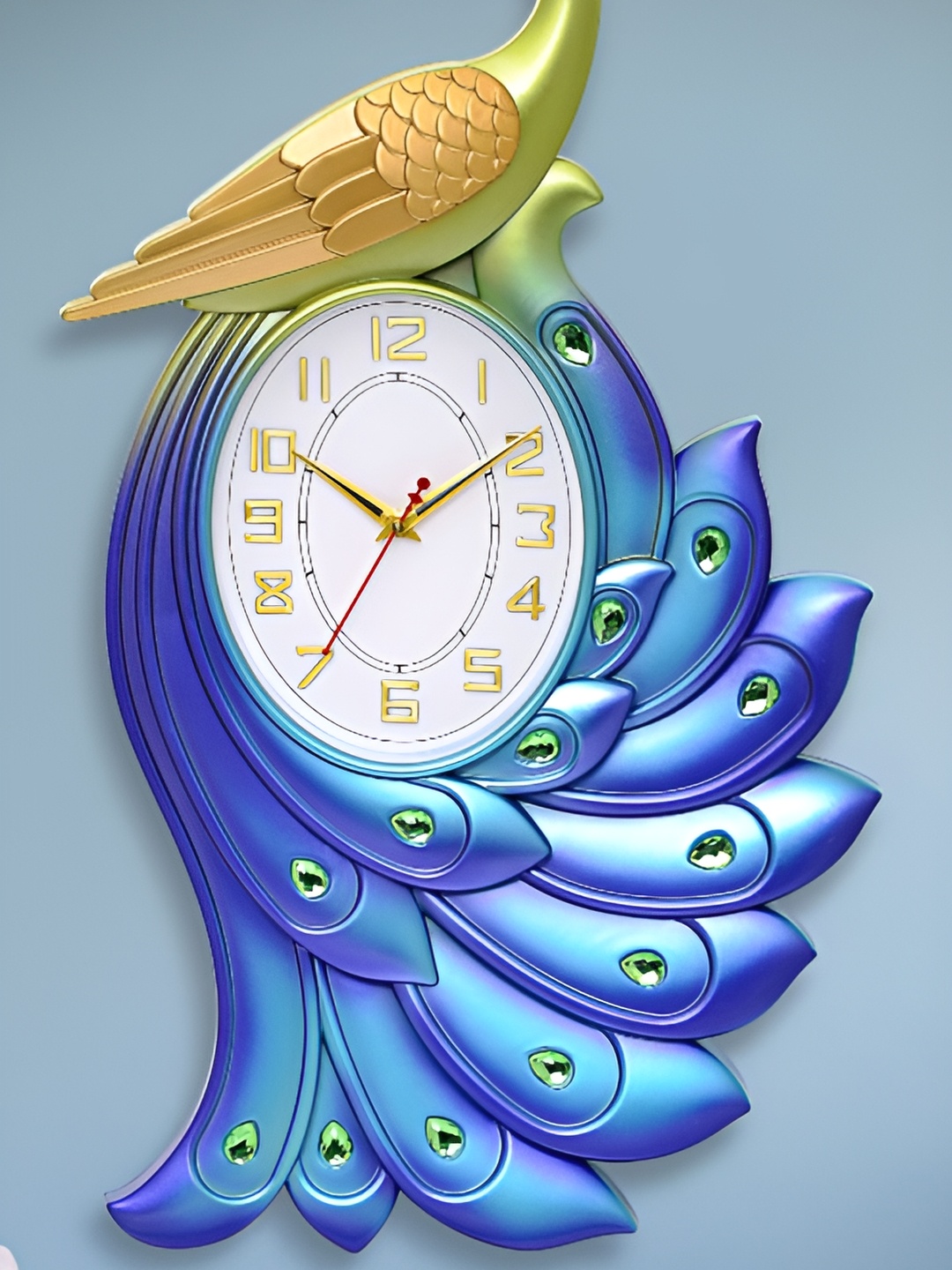 

Attractionz Blue Peacock Oval Shaped Contemporary Analogue Wall Clock