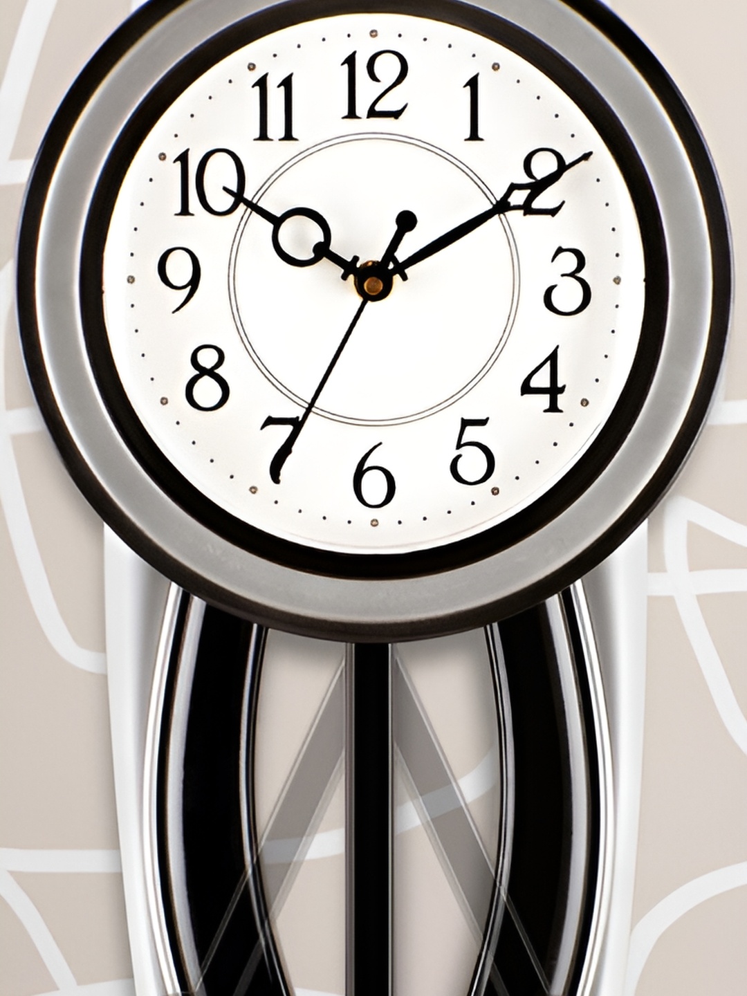 

Attractionz Silver-Toned & Black Round Analogue Contemporary Wall Clock