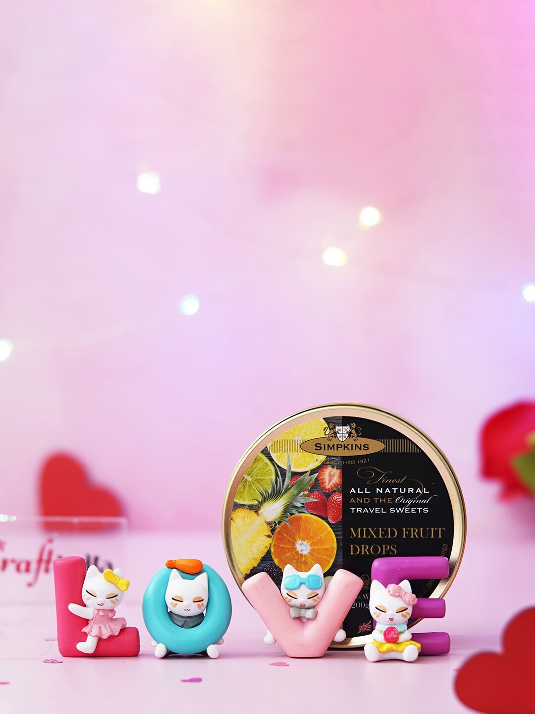 

eCraftIndia LOVE Animated Characters Showpiece And Mixed Fruit Candy Gift Set, Pink