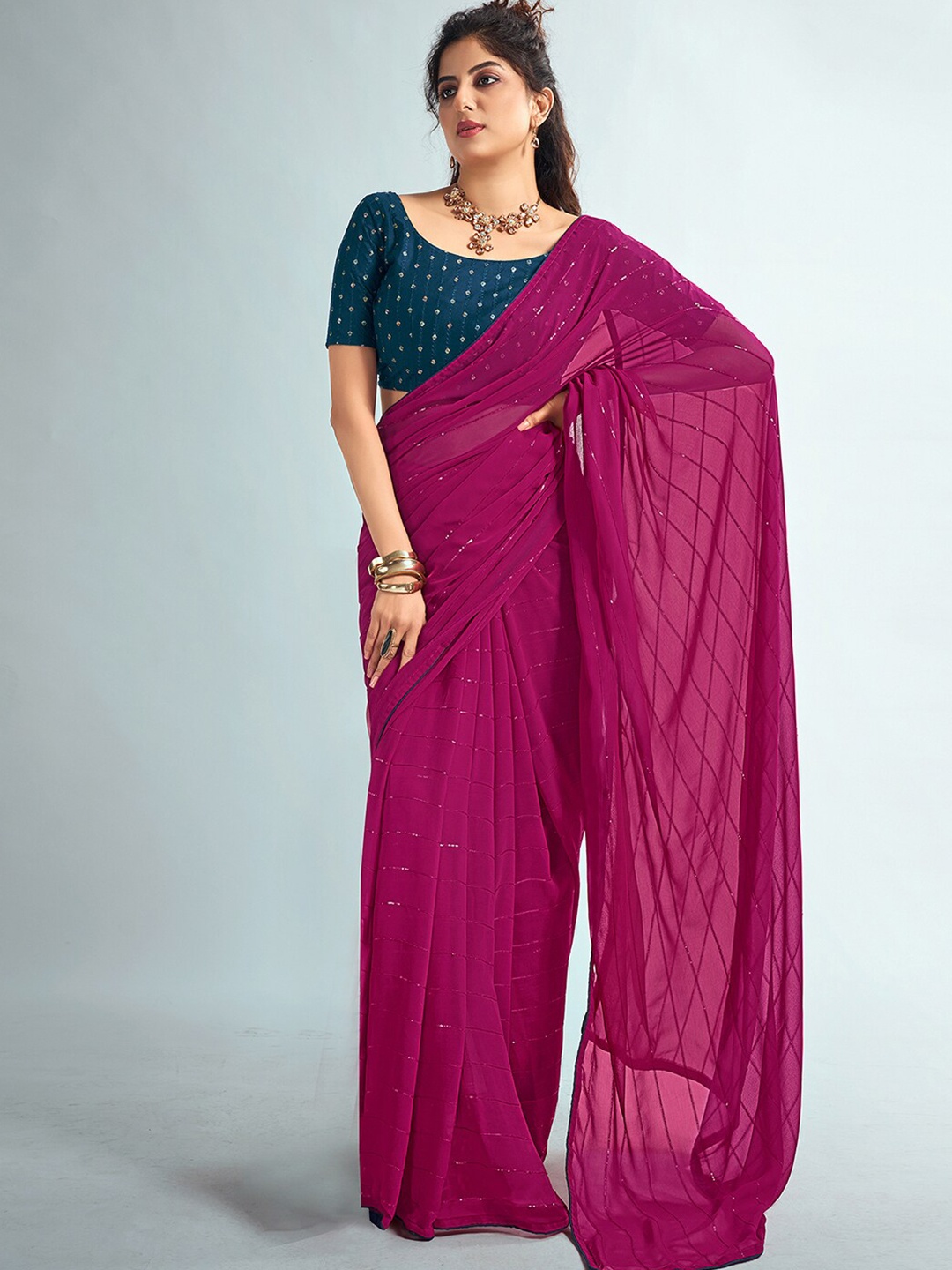 

Mitera Pink & Navy Blue Striped Sequinned Saree