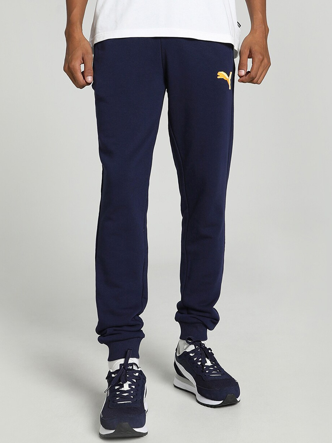 

Puma Men Knitted Graphic Printed Cotton Slim-Fit Joggers, Blue