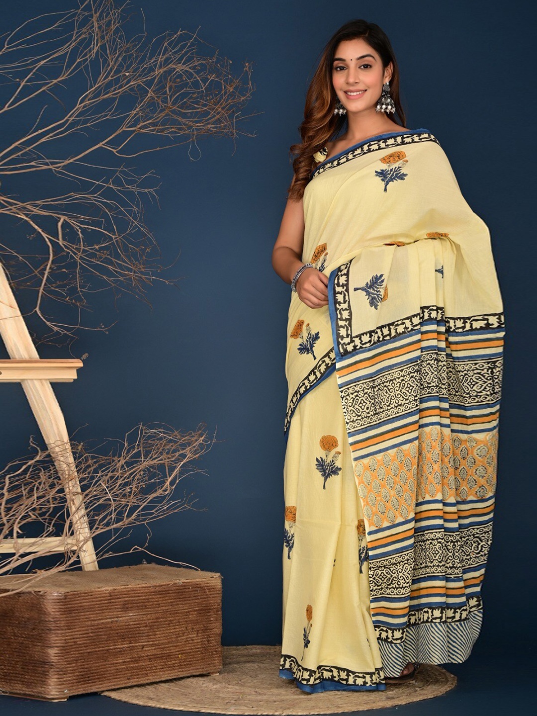

TROPWEAR Floral Printed Block Print Saree, Yellow
