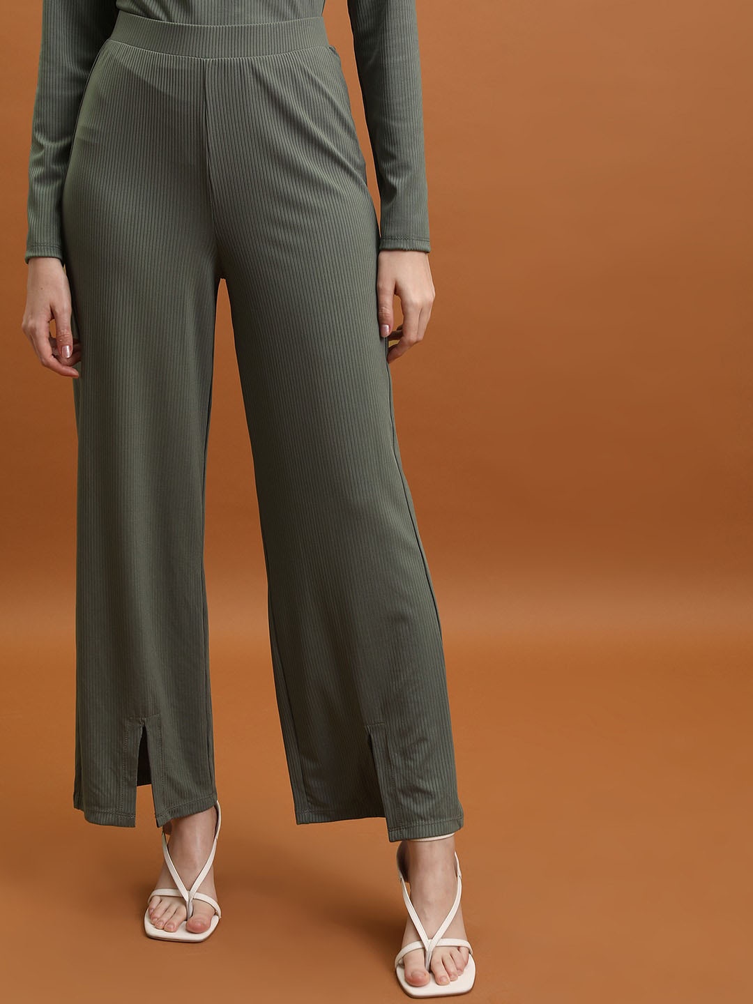 

Tokyo Talkies Women Olive Green Mid-Rise Flared Trousers