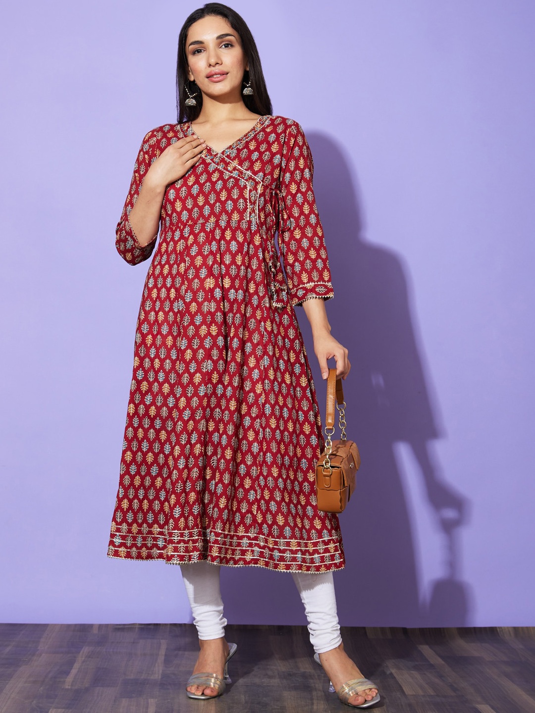 

Globus Maroon Floral Printed Regular Sleeves V Neck Cotton Casual A Line Kurta