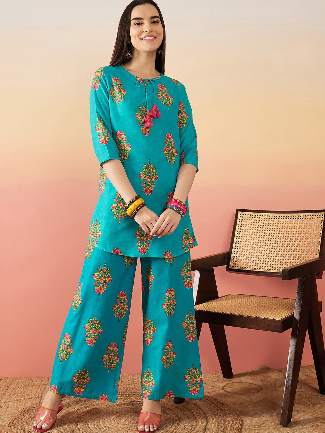 

Sangria Floral Printed Tie Up Neck Ethnic Top With Palazzos, Blue