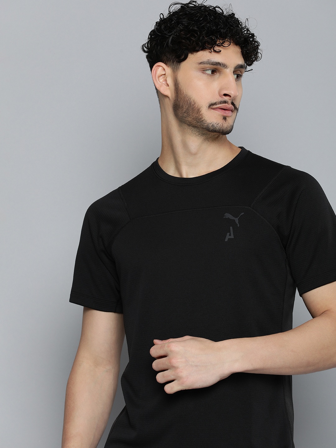 

Puma Self Design SEASONS Running rainCELL T-shirt, Black