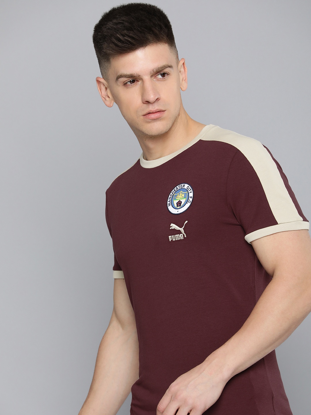 

Puma Manchester City F.C. ftblHeritage T7 Men's Football T-shirt, Maroon