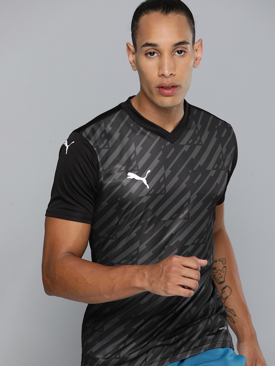 

Puma Men TeamUltimate Football Printed Slim Fit dryCELL T-shirt, Black