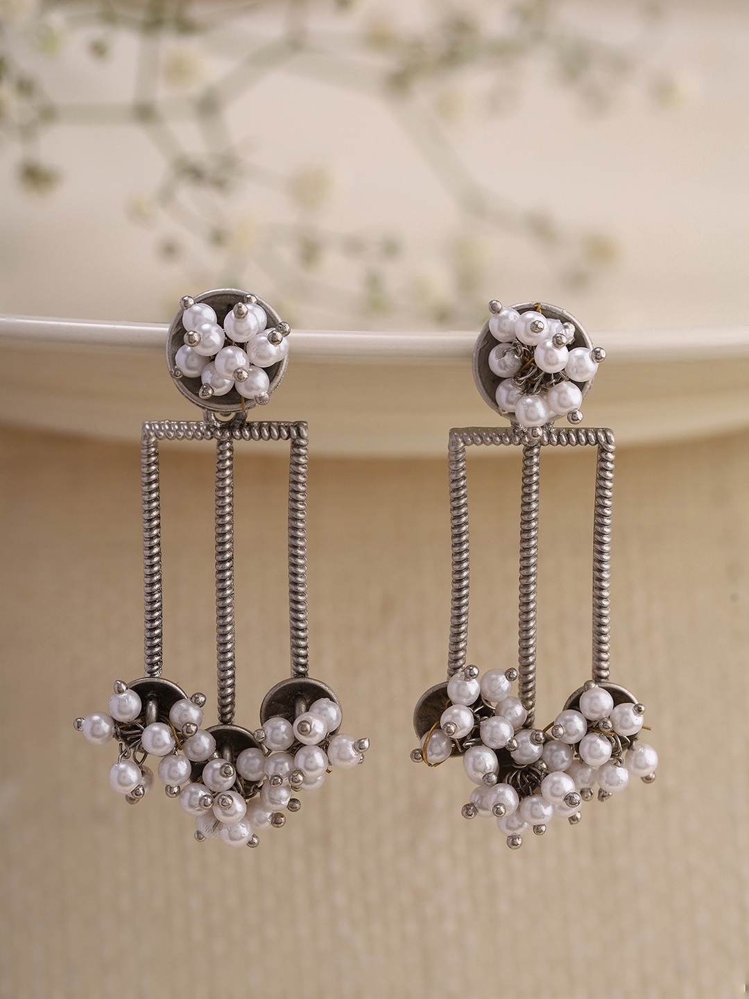 

Priyaasi Silver Plated Contemporary Drop Earrings