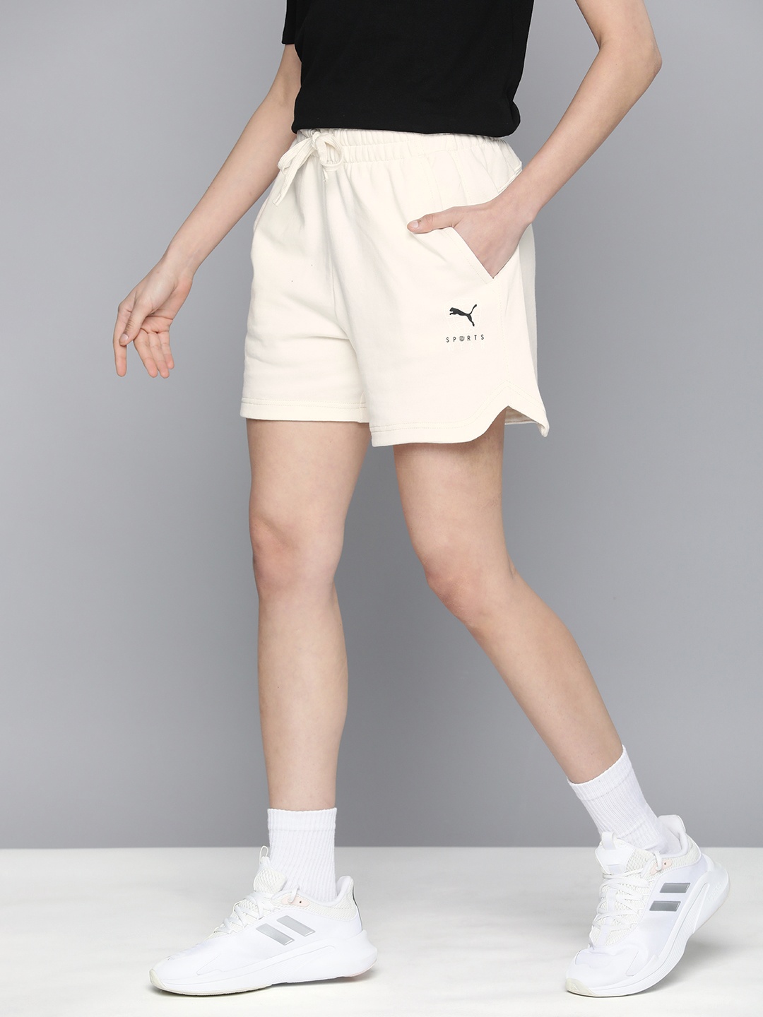

Puma Women High Rise BETTER SPORTSWEAR Outdoor Regular Shorts, Off white