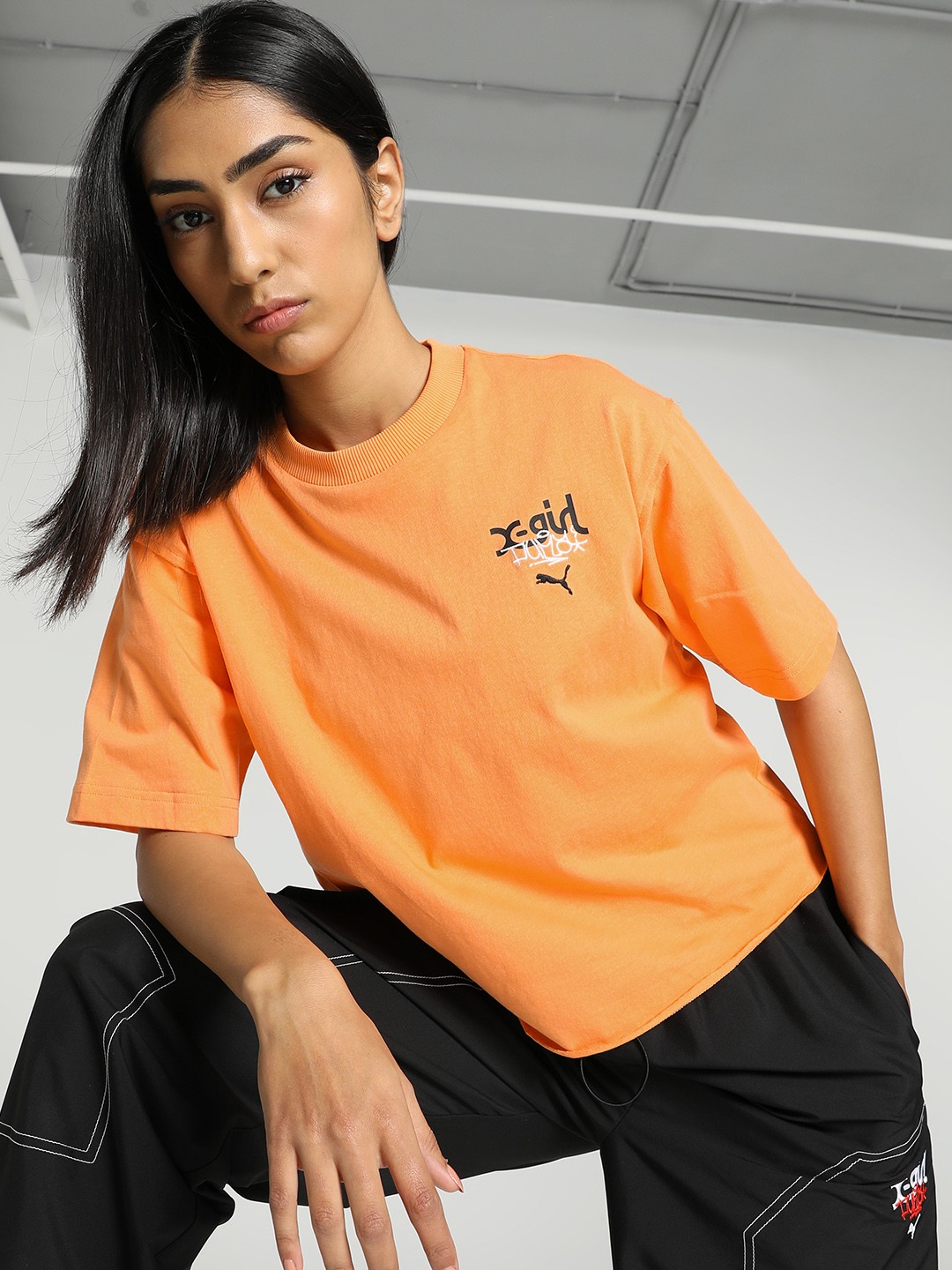 

PUMA x X-GIRL Relaxed Fit Typography Printed Drop-Shoulder Sleeves T-shirt, Orange