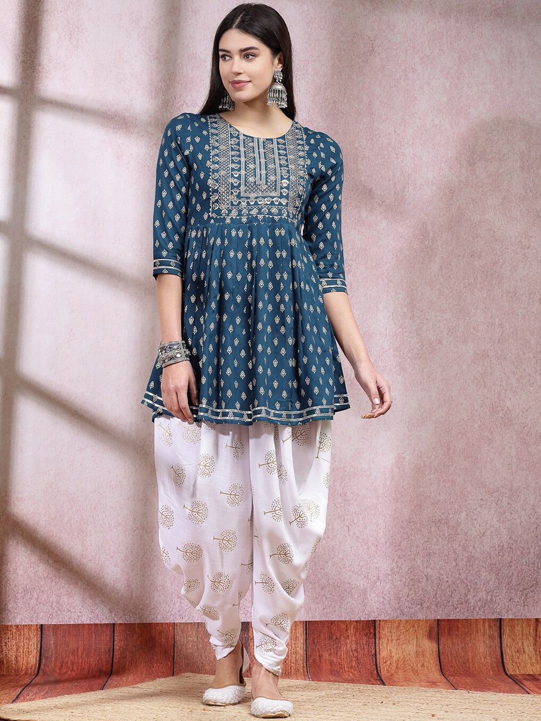 

Stylum Teal Ethnic Motifs Printed & Embroidered Empire A Line Kurti With Dhoti Pant