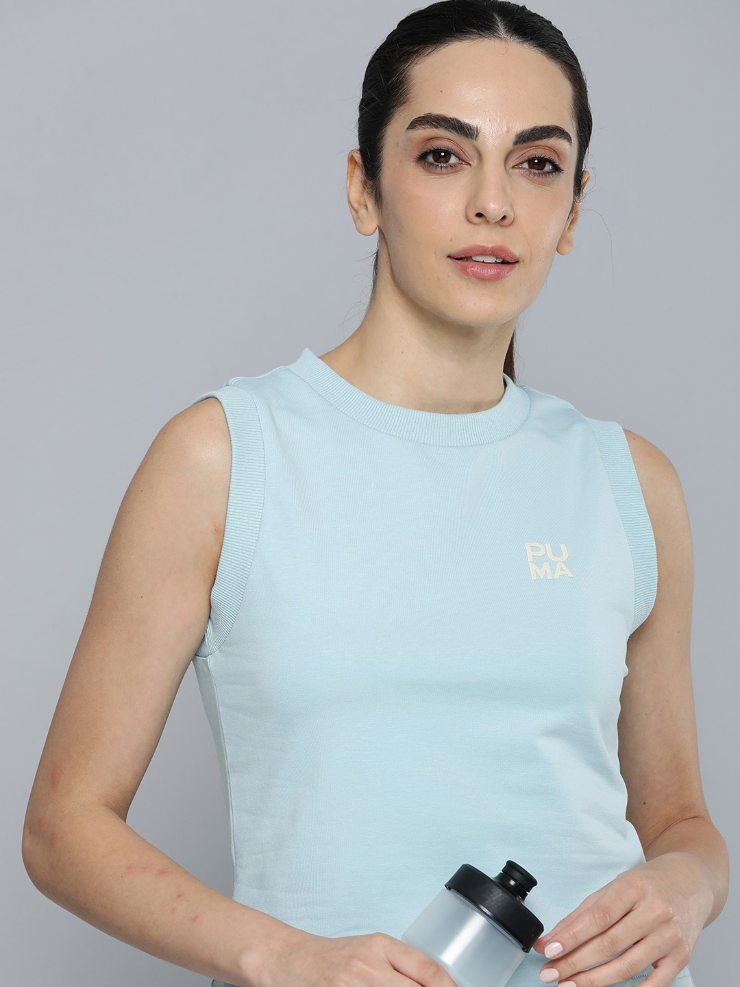 

Puma INFUSE Solid Slim Fit dryCELL Regular Top, Turquoise blue