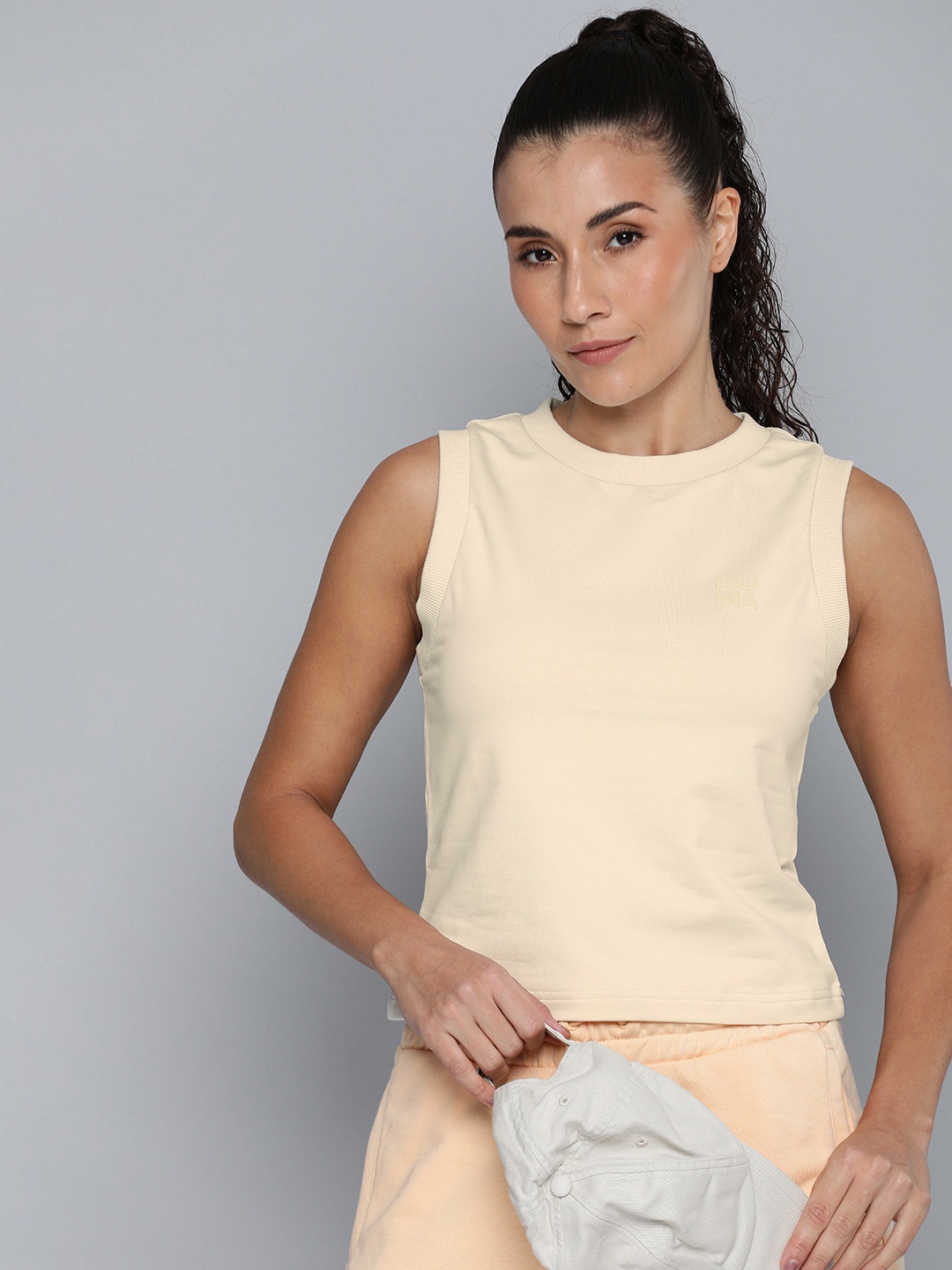 

Puma INFUSE Slim Fit Tank Top, Cream