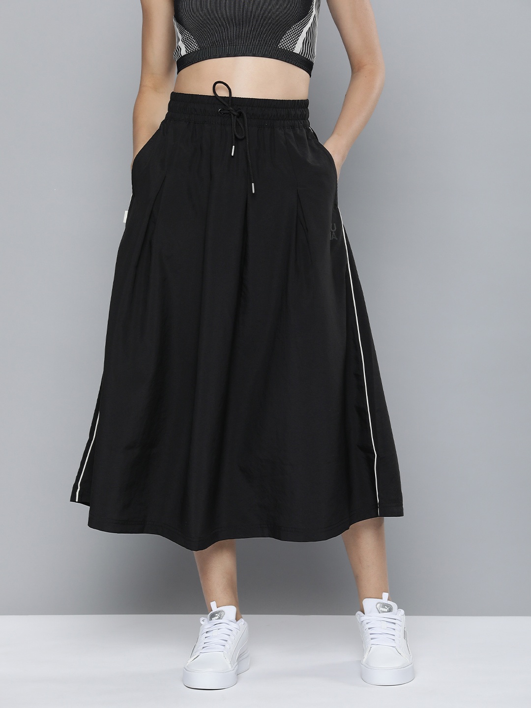 

Puma Women Infuse Solid Pleated Relaxed Fit A-Line Midi Skirt, Black