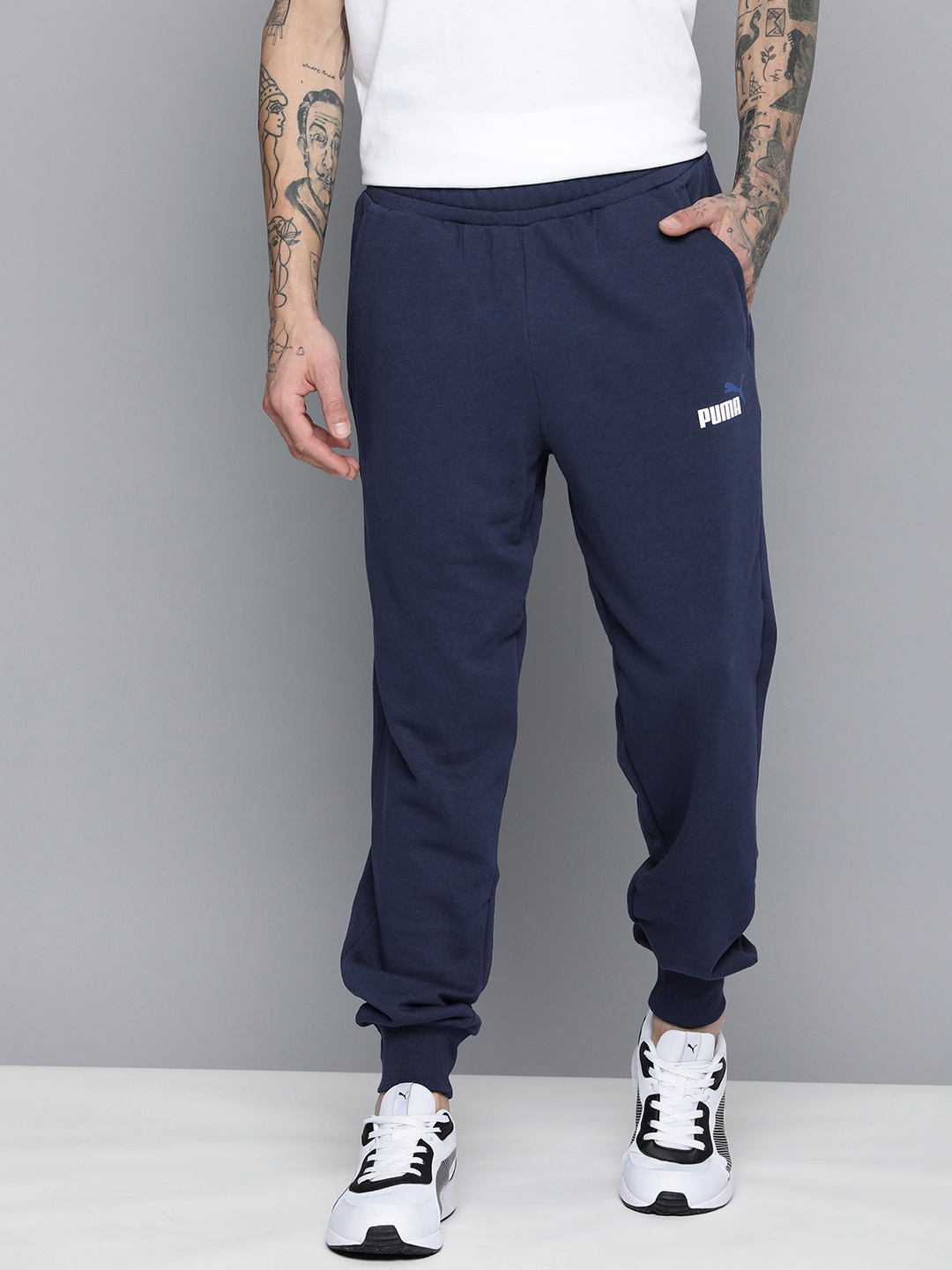 

Puma Men Mid-Rise ESS+ 2 Col Logo Joggers, Navy blue