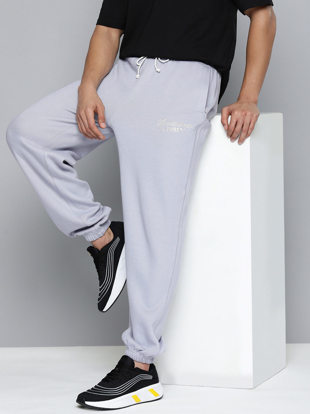 

Puma Men Pure Cotton Relaxed Fit Mid Rise CLASSICS Joggers, Grey