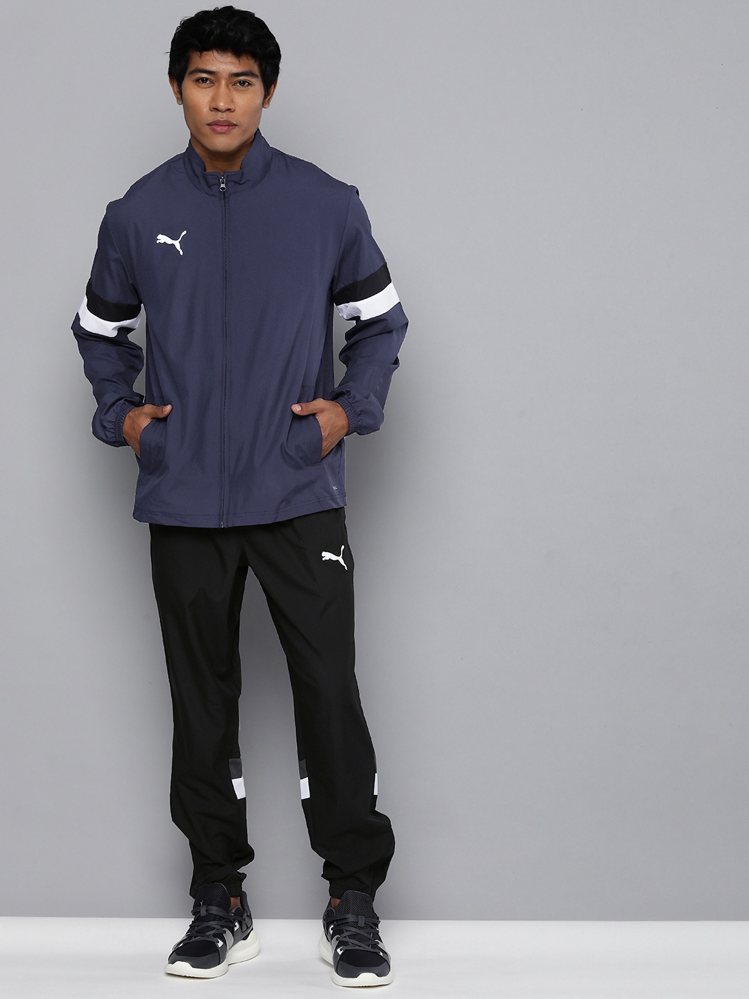 

Puma Men teamRISE DryCell Jacket & Joggers Football Tracksuit, Navy blue