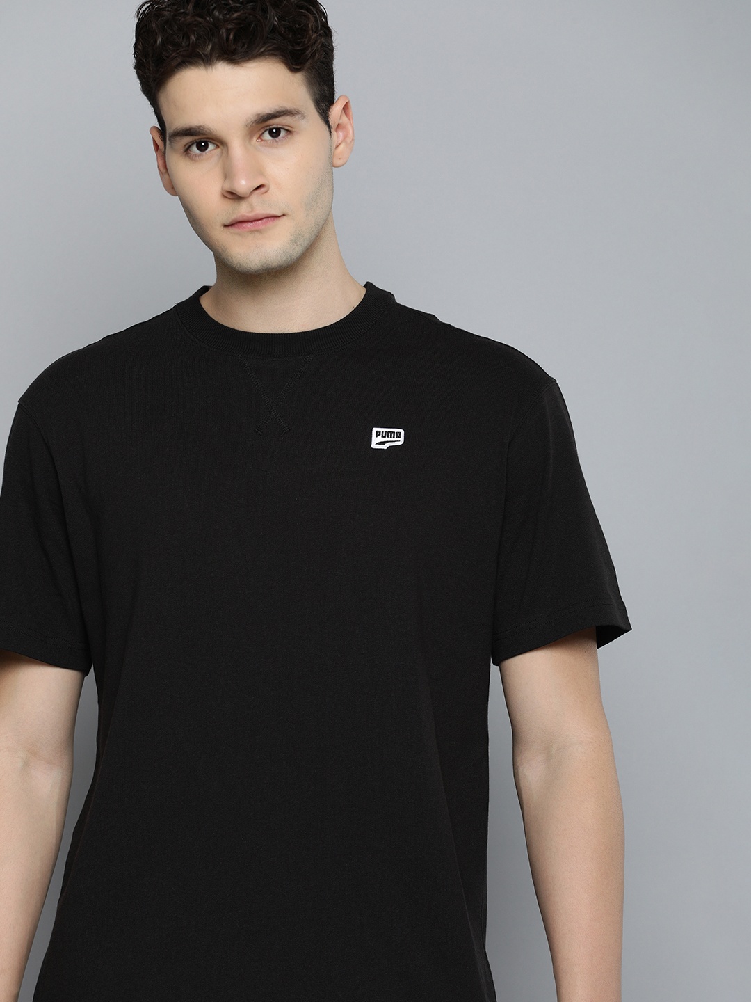 

Puma DOWNTOWN Badge Relaxed Fit T-shirt, Black