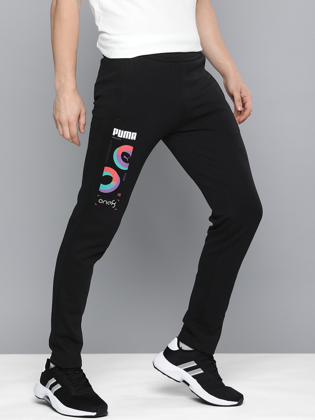 

PUMA x one8 Men Slim Fit Brand Logo Printed Mid-Rise Outdoor Core Elevated Track Pants, Black
