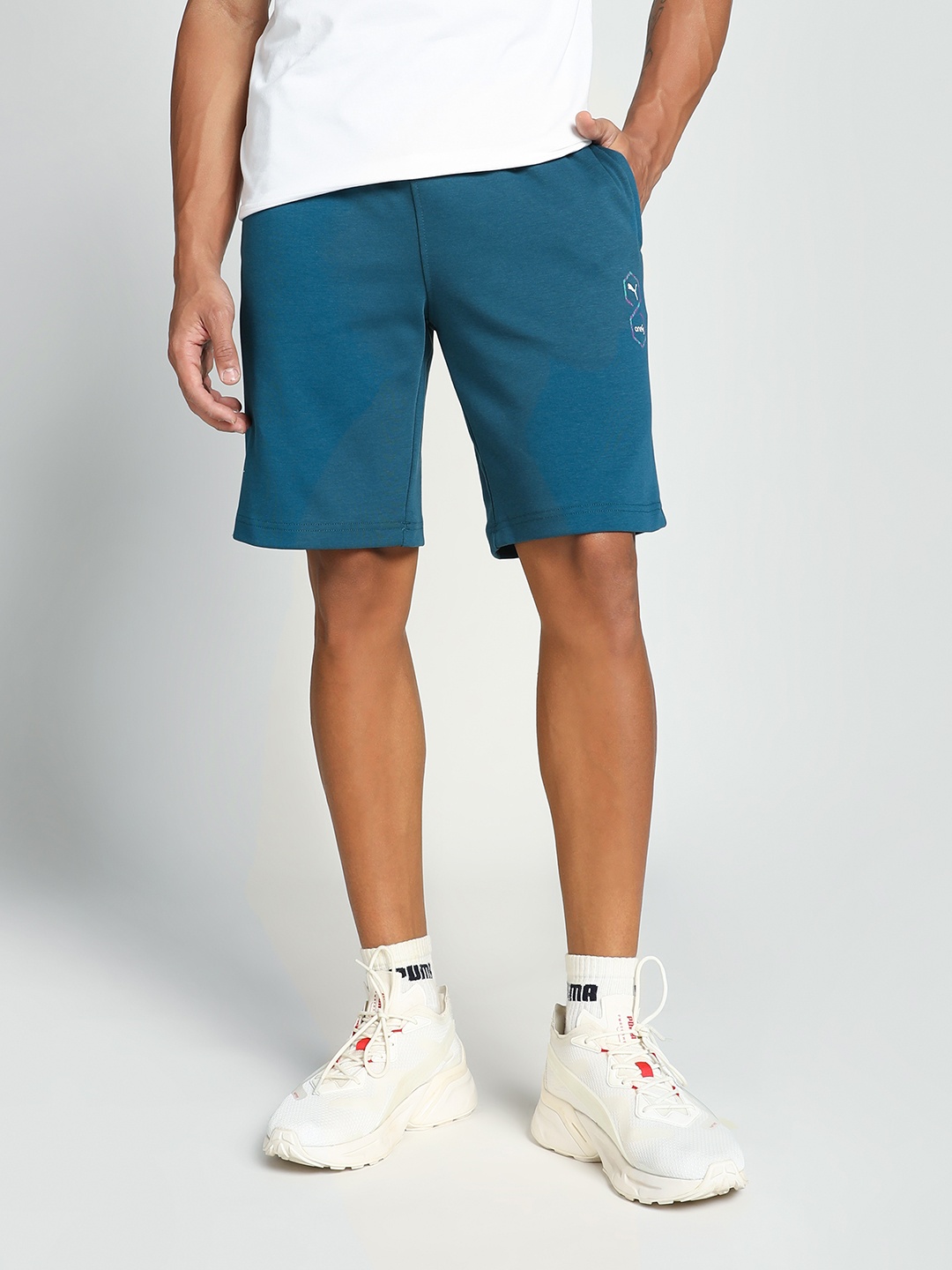 

PUMA x one8 Elevated Slim Fit Typography Printed Outdoor Shorts, Blue