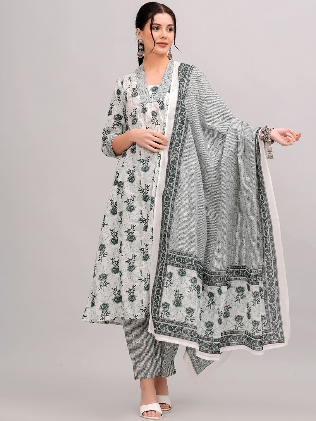 

HIGHLIGHT FASHION EXPORT Pure Cotton Flared Kurta Trouser And Dupatta Set, Green