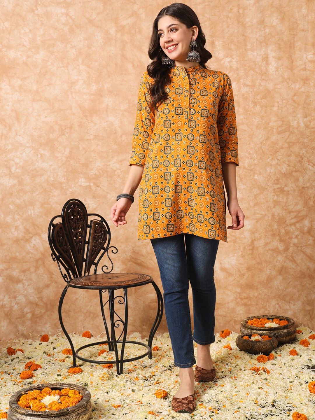 

Meeranshi Ethnic Motifs Printed Band Collar Cotton Kurti, Mustard