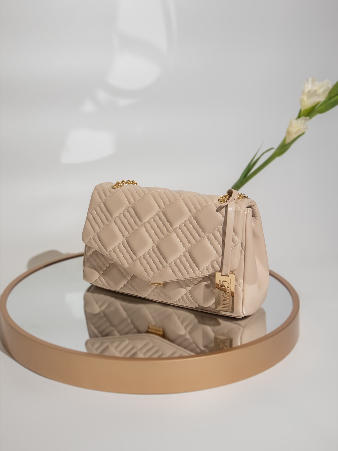 

Inc 5 Textured Structured Quilted Sling Bag, Beige