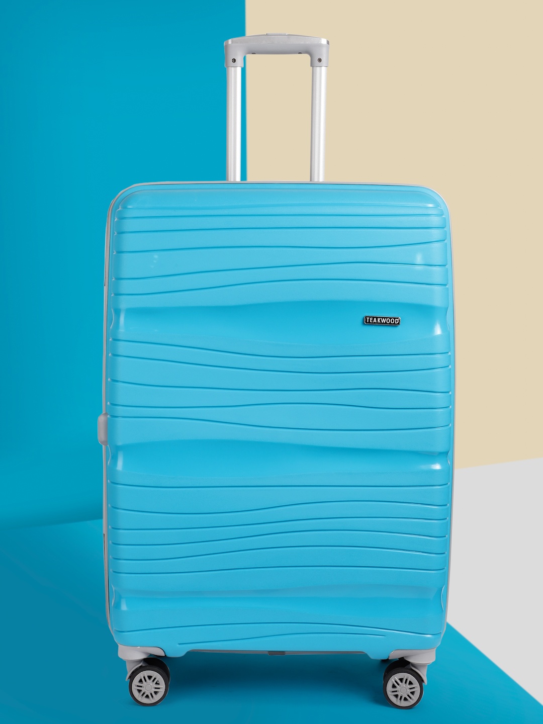 

Teakwood Leathers Iris Textured 360 Degree Rotation Hard Large-Sized Trolley Bag 95L, Blue