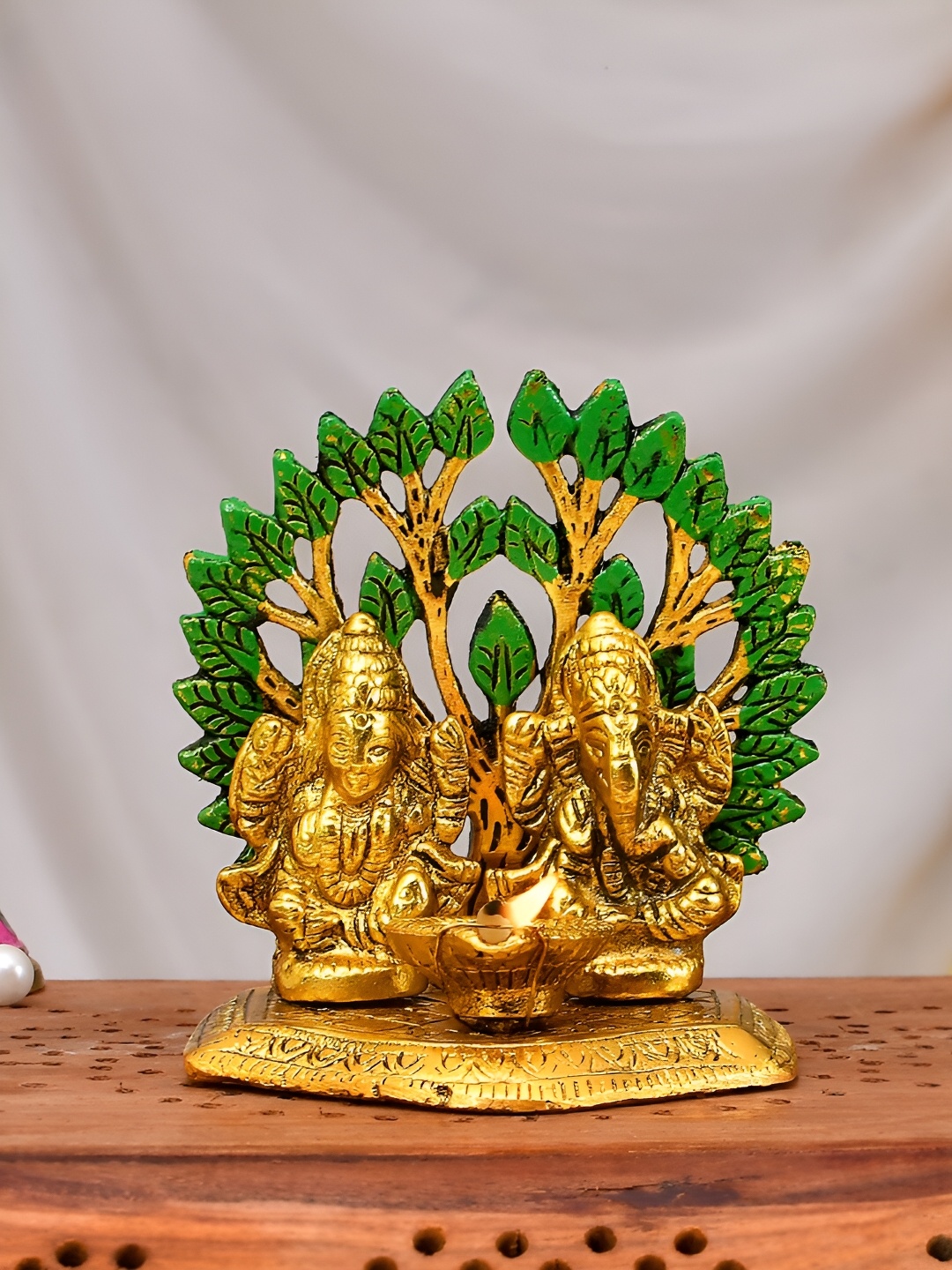 

CraftVatika Gold-Toned & Green Small Metal Religious Diya Lakshmi Ganesha Idol Showpiece