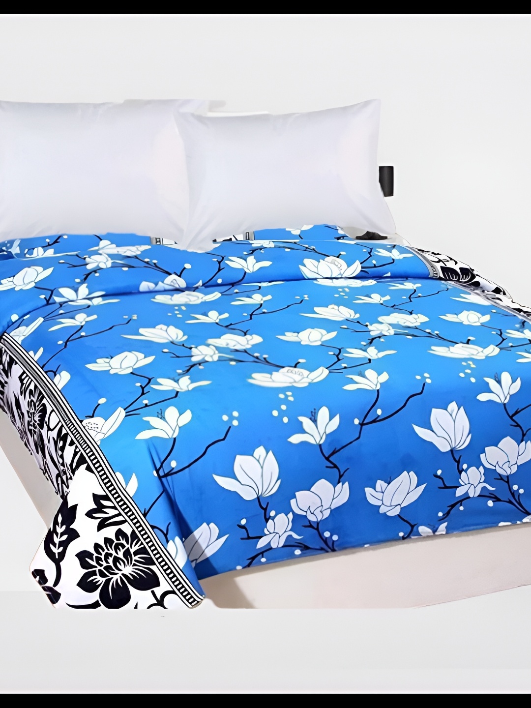 

Supreme Home Collective Blue & White Floral Printed 144 TC Queen Bedsheet