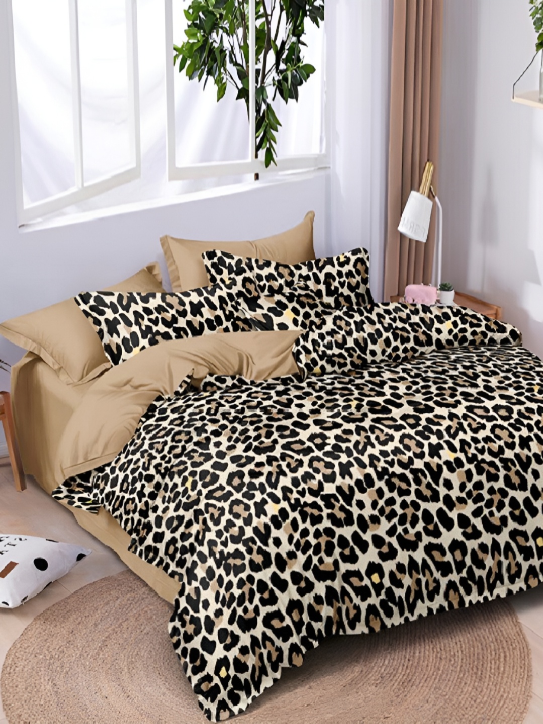 

Laying Style Brown & Black 160 TC Abstract Printed Queen Bedsheet Set