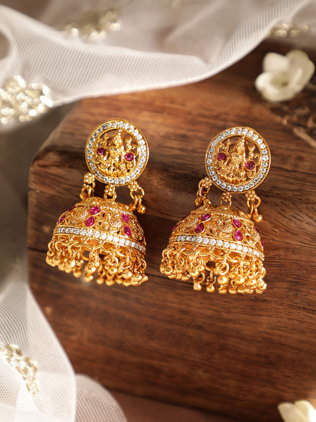 

Rubans 22k Gold Plated Goddess Laxmi Design Ruby CZ Studed with Gold Beaded Temple Jhumka