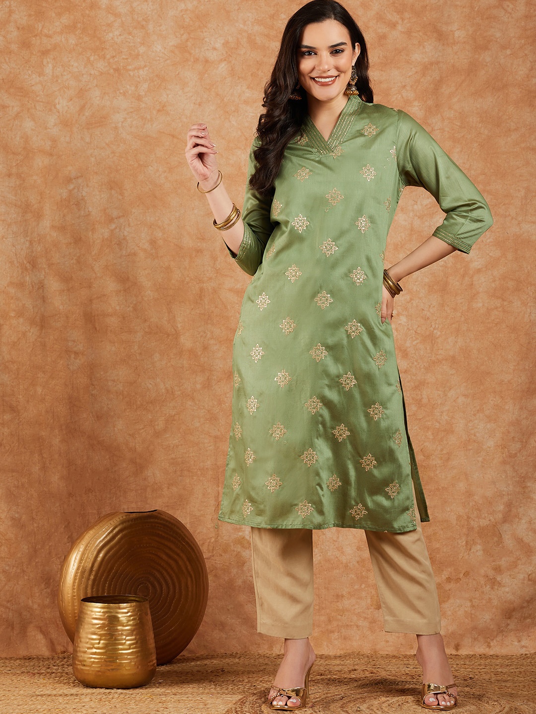 

Sangria Green Ethnic Motif Embroidered V-Neck Regular Straight Kurta