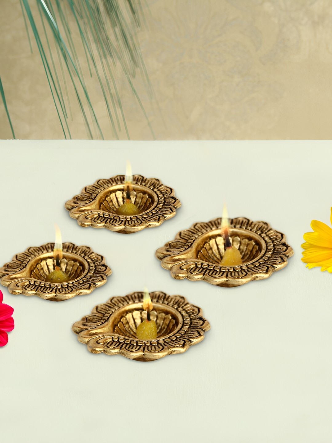 

HANDICRAFTS PARADISE Gold Toned 4 Pieces Diya Metal Religious Idol Showpiece