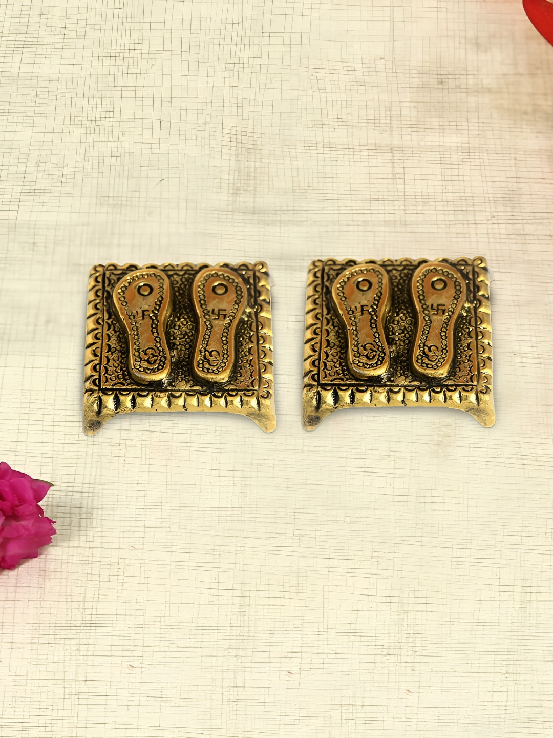 

HANDICRAFTS PARADISE Gold Toned 2 Pieces Charan Paduka Metal Religious Idol Showpiece