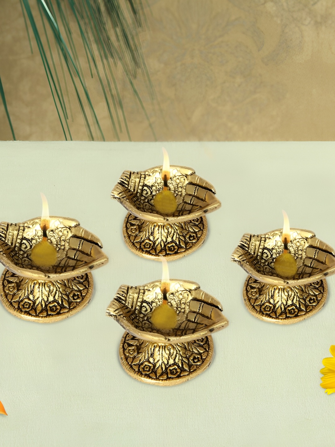 

HANDICRAFTS PARADISE Gold Toned 4 Pieces Diya Metal Religious Idol Showpiece