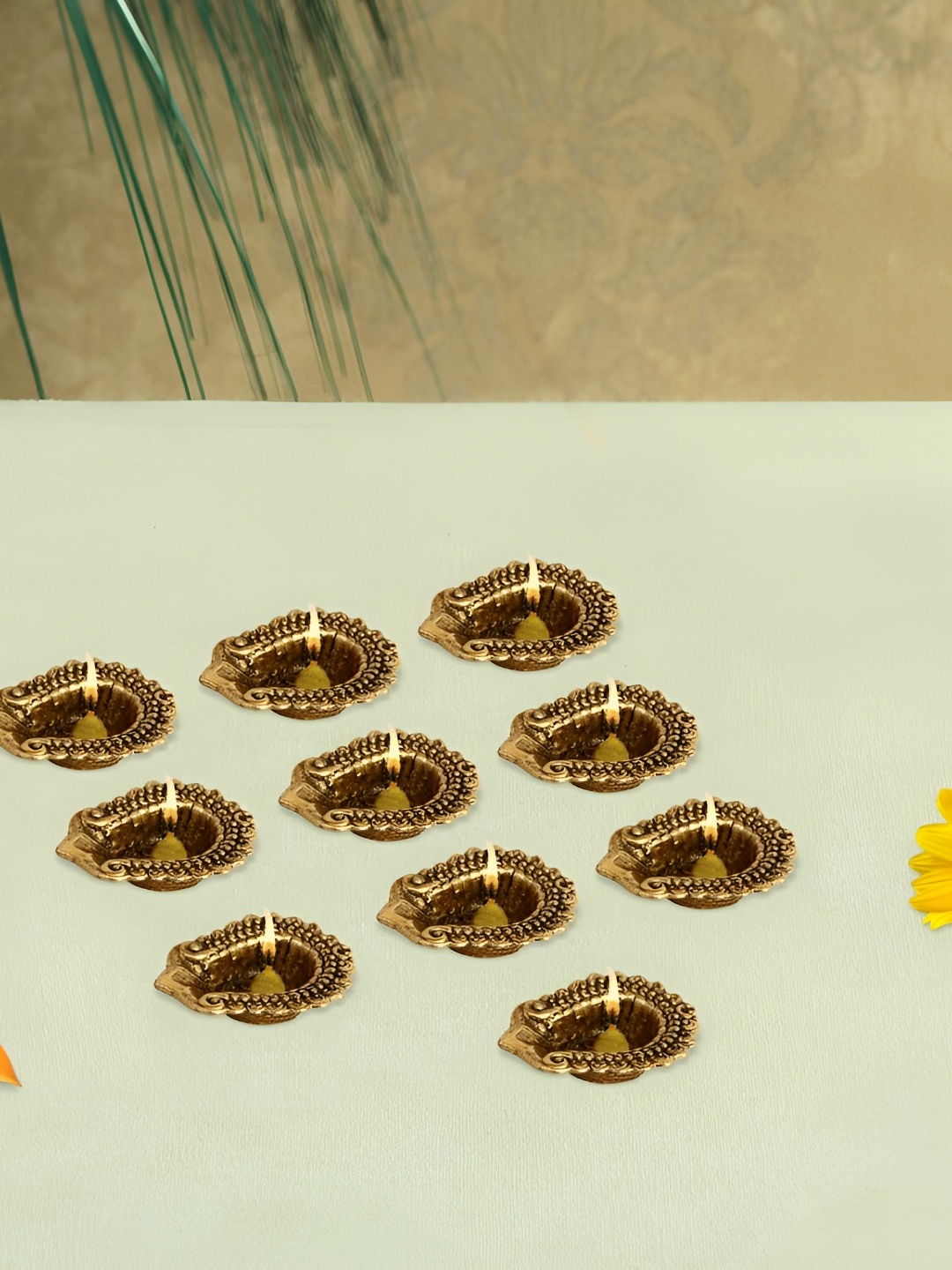 

HANDICRAFTS PARADISE Gold-Toned 10 Pcs Diya Showpiece