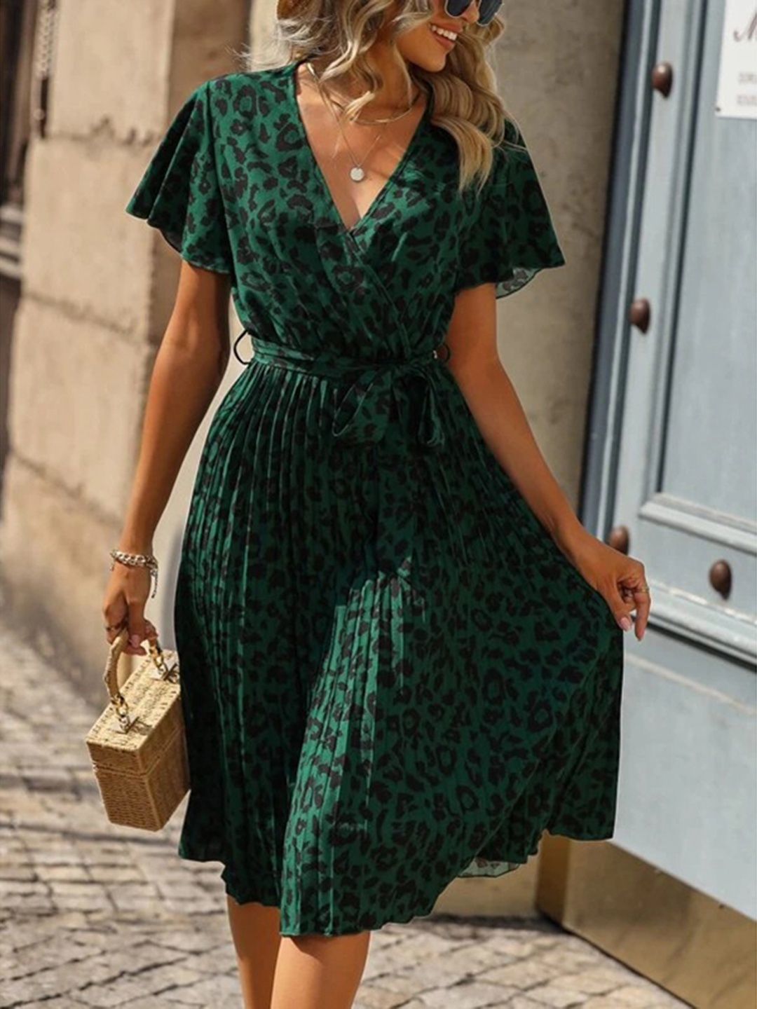 

StyleCast Green Animal Printed Wrap Dress